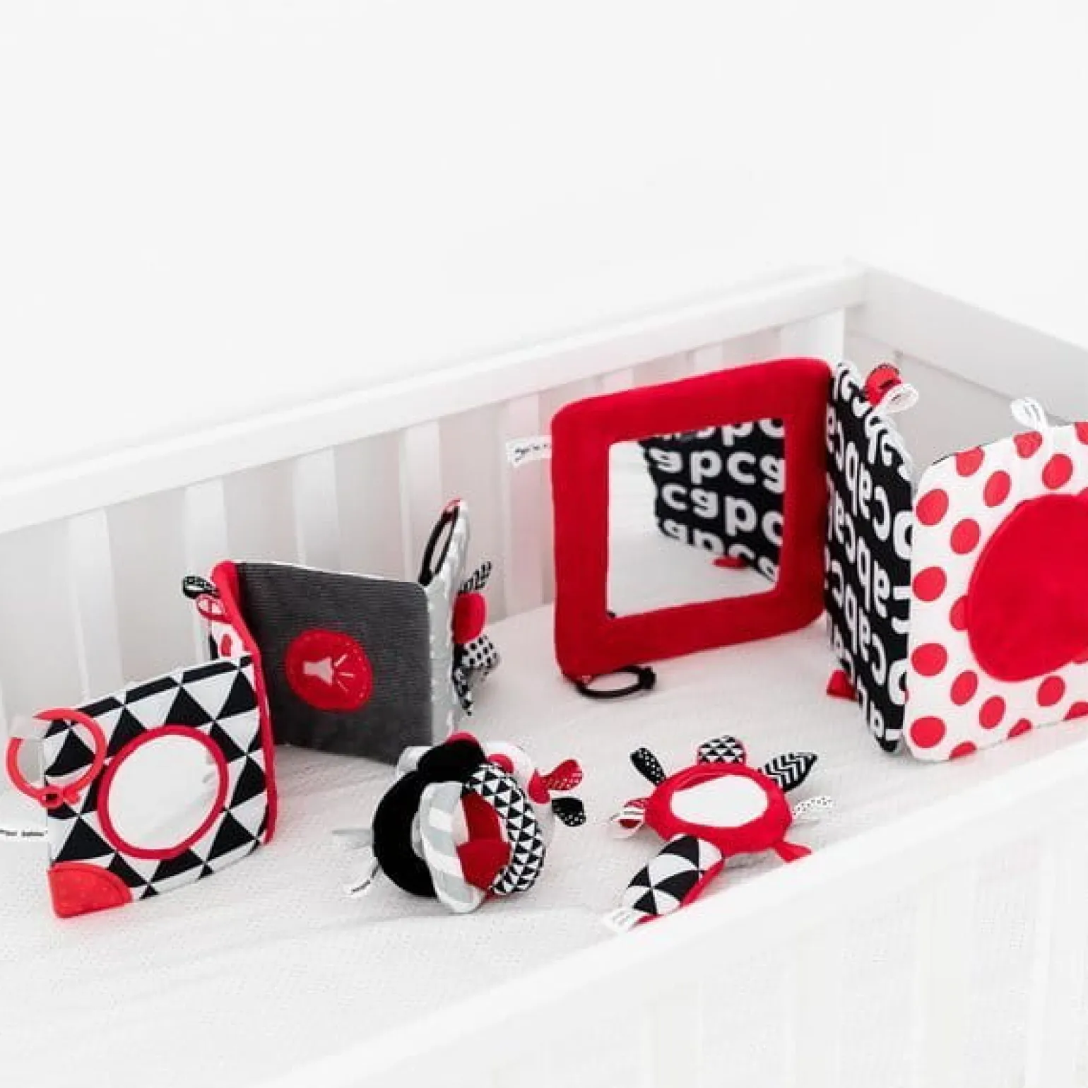 Canpol babies Kontrastowa karuzela pluszowa z pozytywką SENSORY TOYS